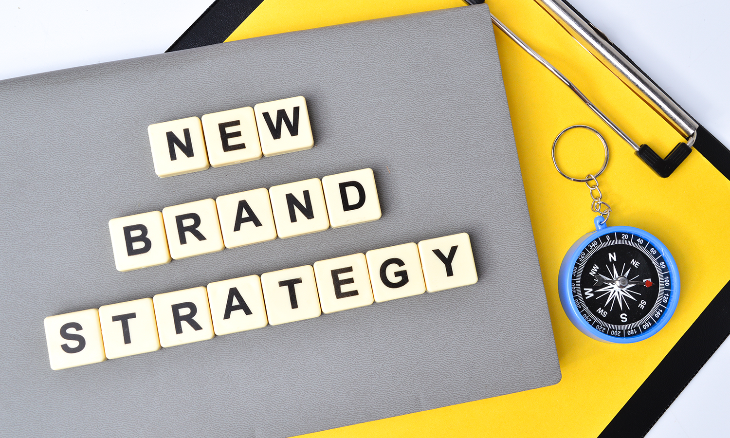 tnapis ulozony na laptopie them new brand strategy napis ulozony na laptopie them new brand strategy
